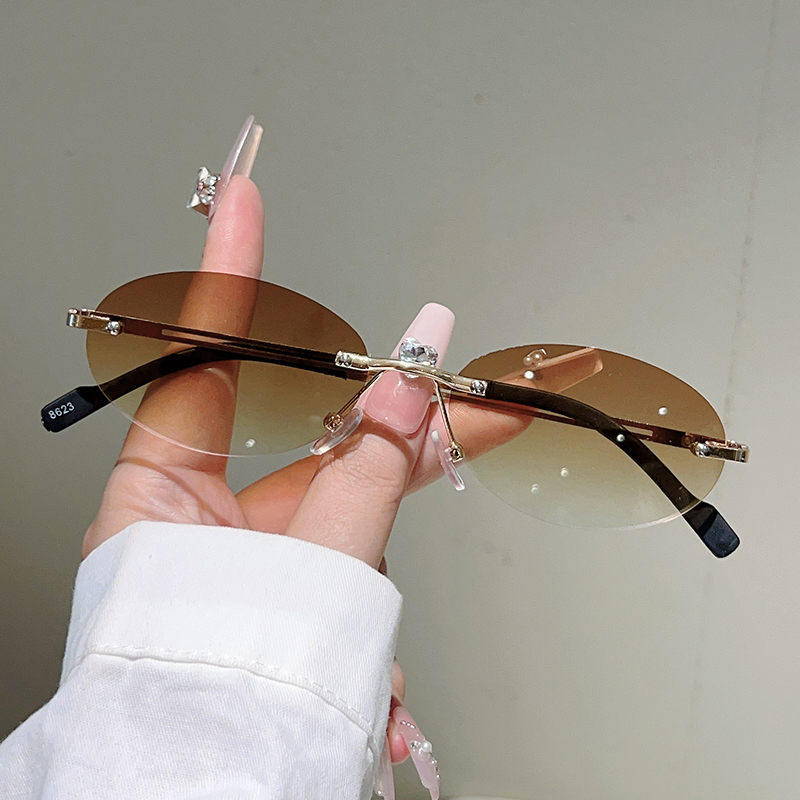 Rimless Oval Sunglasses Women  - Designer Sunglasses recension och pris
